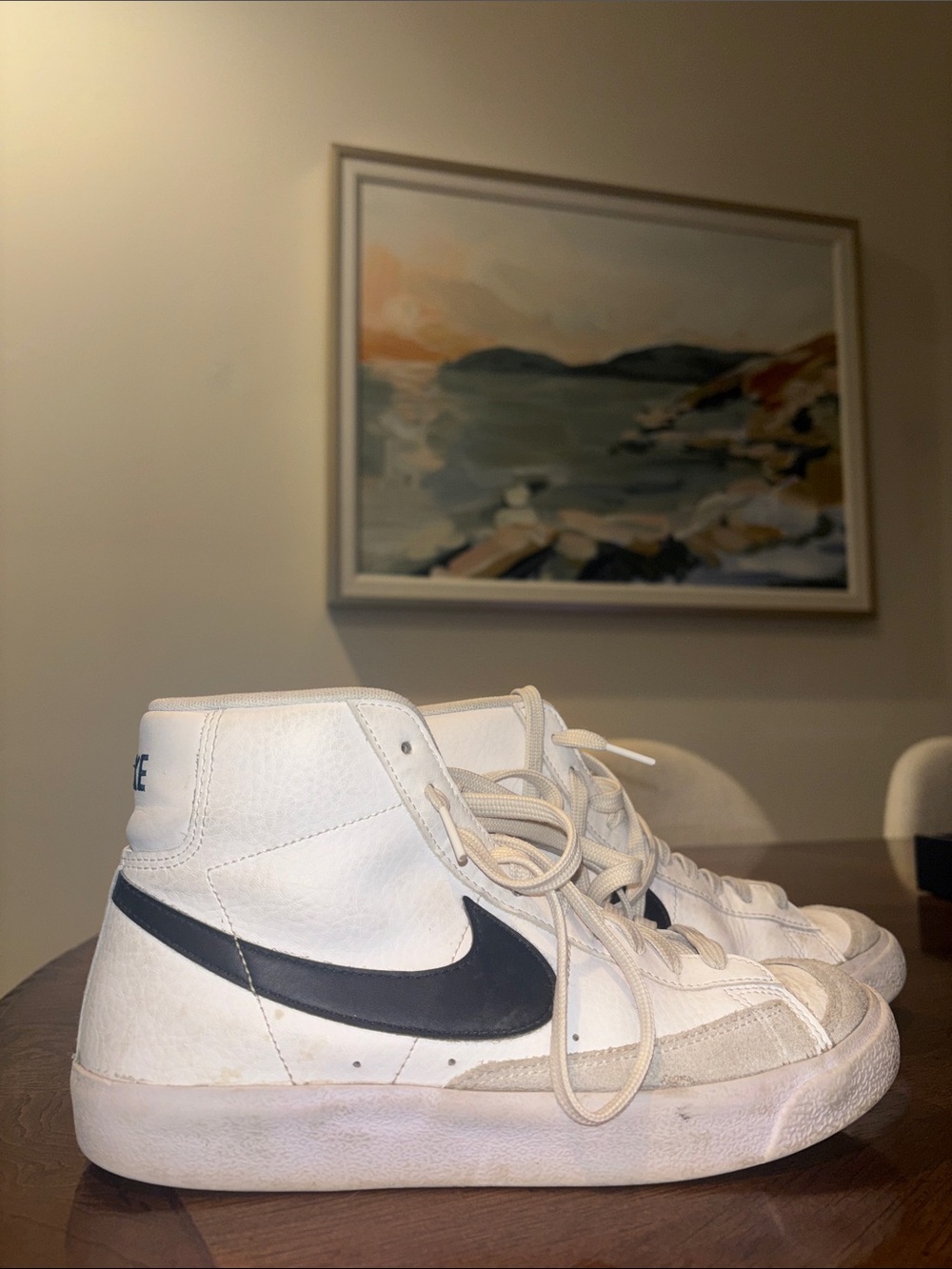 Nike White High-Top Sneakers with Black Swoosh Accent
